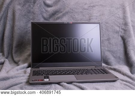 Novopolotsk, Belarus - 06 February, 2021: Lenovo Ideapad Laptop On A Gray Background