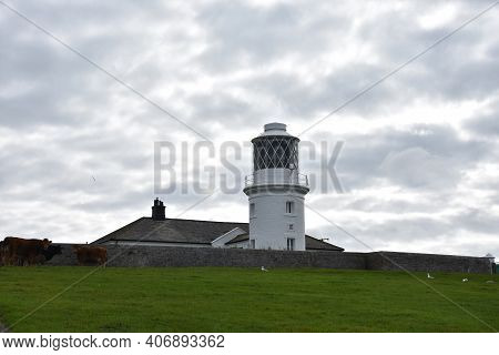 Cloudy Day At St Bees Lighthouse In West Cumbria England.