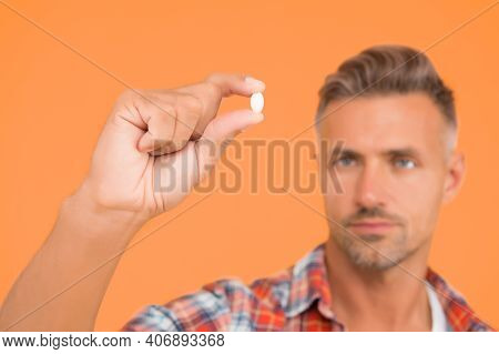 Vitamin Pill In Hand. Side Effects. Medicines Concept. Hemp Derived Cbd. Food Additives Vitamins For