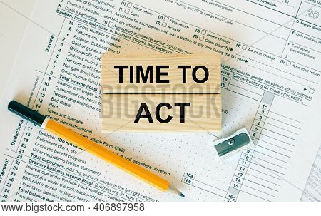 Wooden Blocks With Text Time To Act On Financial Docs