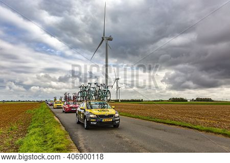 Le Gault-saint-denis, France - October 08, 2017: Row Of Technical Vehicles Driving On A Road In The 