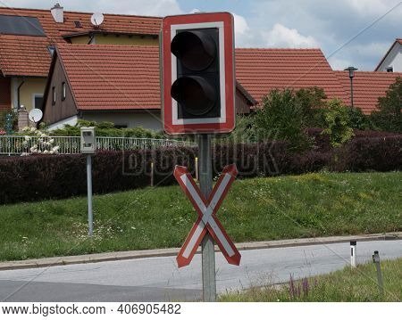Ungated Railroad Crossing With Level Crossing Sign