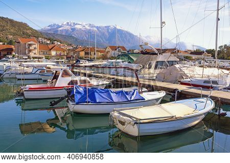 Fishing Boats In Harbor. Beautiful Winter Mediterranean Landscape. Montenegro. View Of Marina Kalima