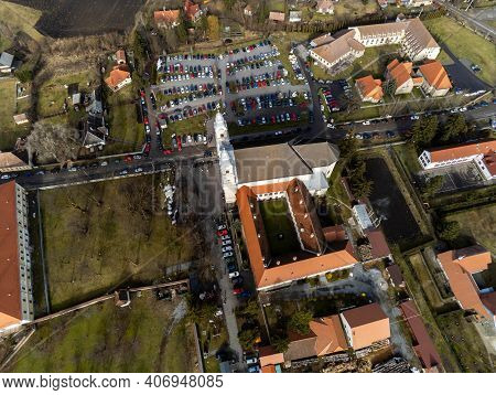Sumuleu Ciuc, Romania- 07 February 2021: Aerial View , Local Catholic Church, One Of The Most Visite