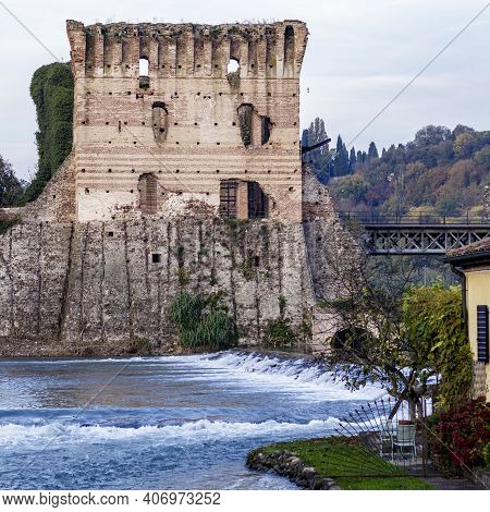 Ruins Of A Tower Of The Fortress On The Bank Of The Mincio River In Borghetto Sul Mincio Vr