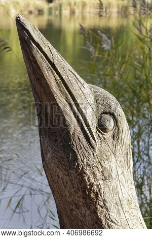 The Lake Of Fie In Trentino. A Place Surrounded By Nature With Trails For All Ages And Wooden Sculpt