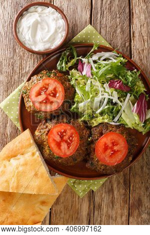 Pakistani Chapli Kebab Closeup In The Pan. Vertical Top View