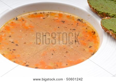 Italian Minestrone Soup With Pesto Crostini On Side