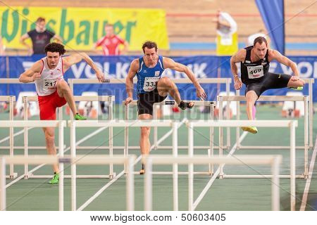 VIENNA, AUSTRIA - JANUARY 29 Gianni Frankis (#217 Great Britain) wins the men's 60m hurdles event on January 29, 2013 in Vienna, Austria.