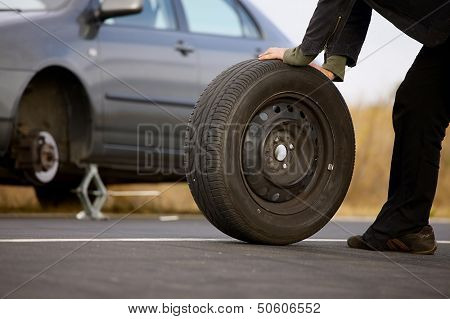 Changing wheels on a car