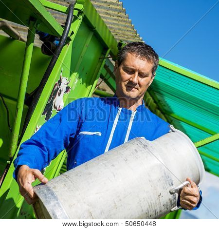 Farmer With Milk Containers