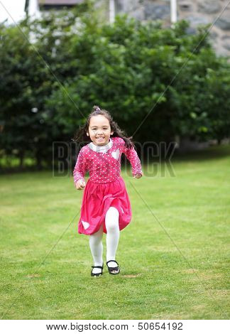 Happy running girl child