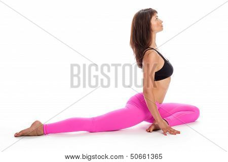 Pretty Woman In Yoga Pose - Pigeon Position.