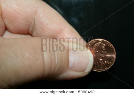 einen Penny Kneifen