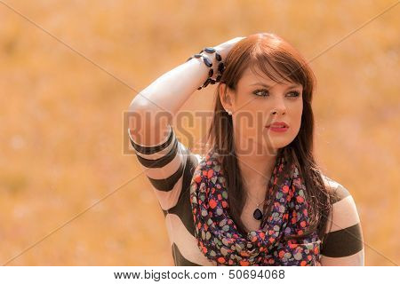 Beautiful Young Woman Thoughtful In Nature
