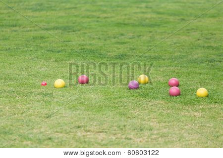 Colorful Bocce Balls In Green Lawn
