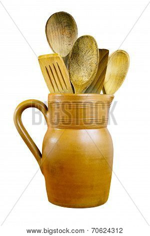 Clay Jug And Wooden Spoons