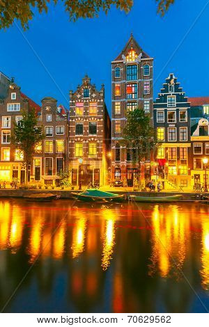 Night City View Of Amsterdam Canal With Dutch Houses