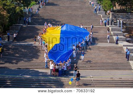 ODESSA, UKRAINE - August 23: Flash mob in city of Odessa on Potemkin Stairs on August 23, 2014, in day of a national flag of Ukraine.