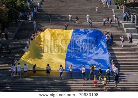 ODESSA, UKRAINE - August 23: Flash mob in city of Odessa on Potemkin Stairs on August 23, 2014, in day of a national flag of Ukraine.