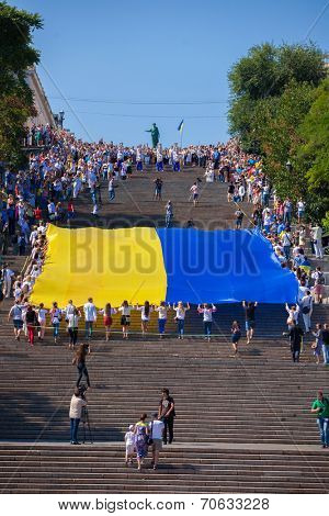 ODESSA, UKRAINE - August 23: Flash mob in city of Odessa on Potemkin Stairs on August 23, 2014, in day of a national flag of Ukraine.