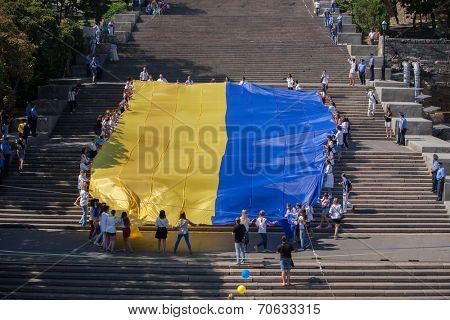 ODESSA, UKRAINE - August 23: Flash mob in city of Odessa on Potemkin Stairs on August 23, 2014, in day of a national flag of Ukraine.