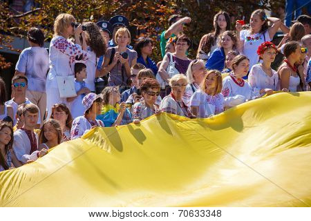ODESSA, UKRAINE - August 23: Flash mob in city of Odessa on Potemkin Stairs on August 23, 2014, in day of a national flag of Ukraine.
