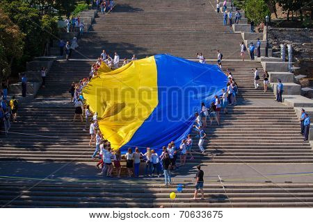 ODESSA, UKRAINE - August 23: Flash mob in city of Odessa on Potemkin Stairs on August 23, 2014, in day of a national flag of Ukraine.