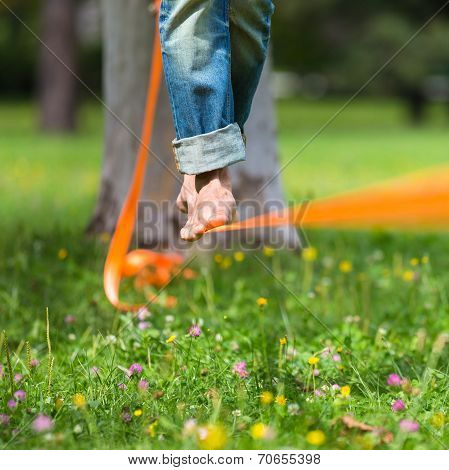Slack line in the city park.