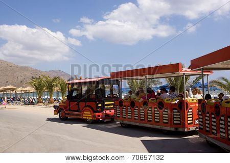 Stylized Train Carriages On The Streets Of Georgioupolis