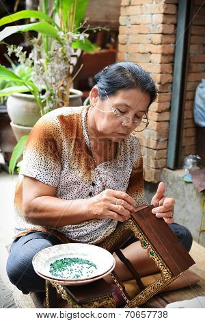 An Unidentified Old Woman Build Altar Table .