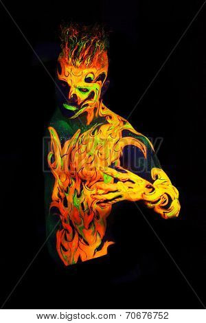 Body art glowing in ultraviolet light -  Fire 