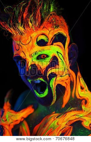Body art glowing in ultraviolet light -  Fire 