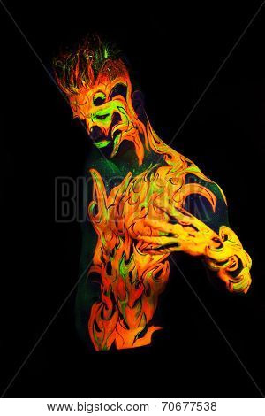 Body art glowing in ultraviolet light -  Fire 