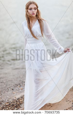 Portrait of beautiful woman on the beach