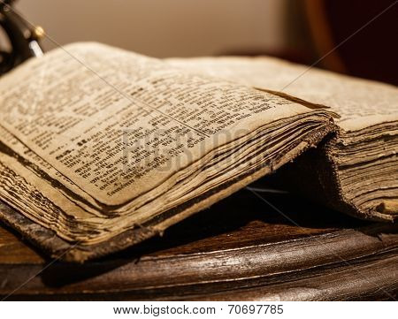 Vintage book on a wooden table 
