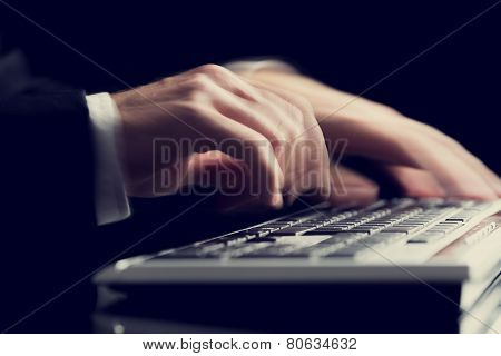 Business Man Typing On A Computer Keyboard