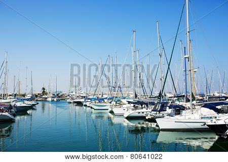 Yachts and boats in old port in Mediterranean sea