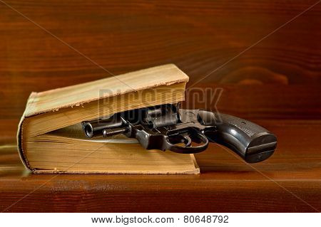 Book With Handgun
