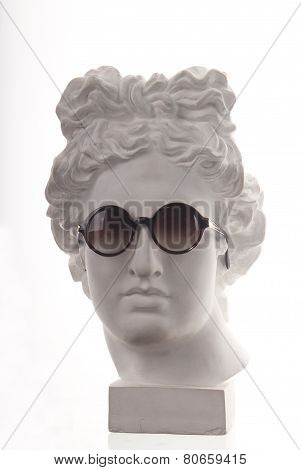 Plaster bust o in glasses