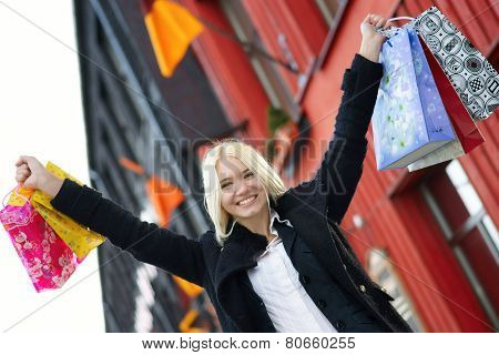 Girl with lots of shopping bags