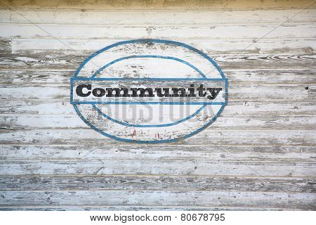 Community sign on shed side