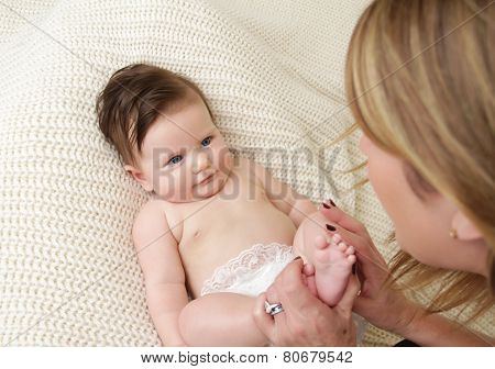 Mother Playing With Baby