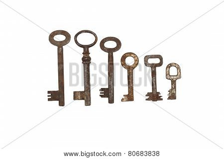 Collection of old rusty keys, isolated on white