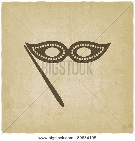 Masquerade mask symbol old background