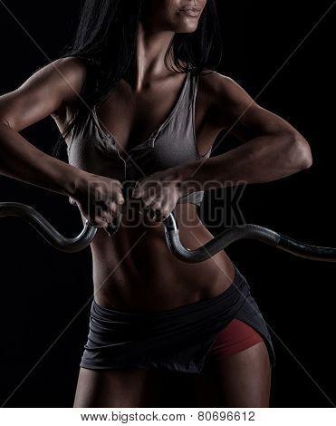 Brutal Athletic Woman Pumping Up Muscles With Dumbbells