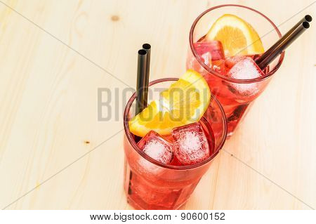 Close-up Of Glasses Of Spritz Aperitif Aperol Cocktail With Orange Slices And Ice Cubes
