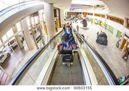 Tourists With Their Baggage  At Lanzarote Airport