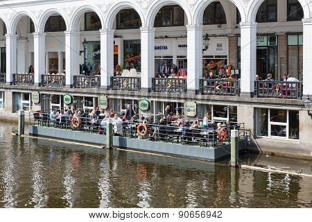 People Sitting At Floating Terrace  In Hamburg, Germany