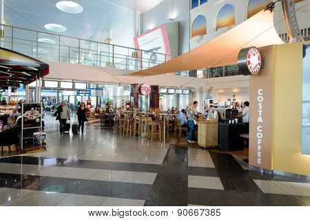 DUBAI, UAE - MARCH 10, 2015: DXB airport interior. Dubai International Airport is the primary airport serving Dubai, and is the world's busiest airport by international passenger traffic.